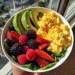 Healthy Power Breakfast Bowl with Scrambled Eggs, Avocado & Berries