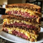 Christmas Healthy Corned beef layered with rye bread, sauerkraut, and Swiss cheese