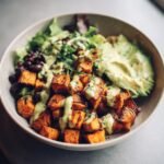 Healthy Sweet Potato and Black Bean Bowls with Avocado Lime Dressing