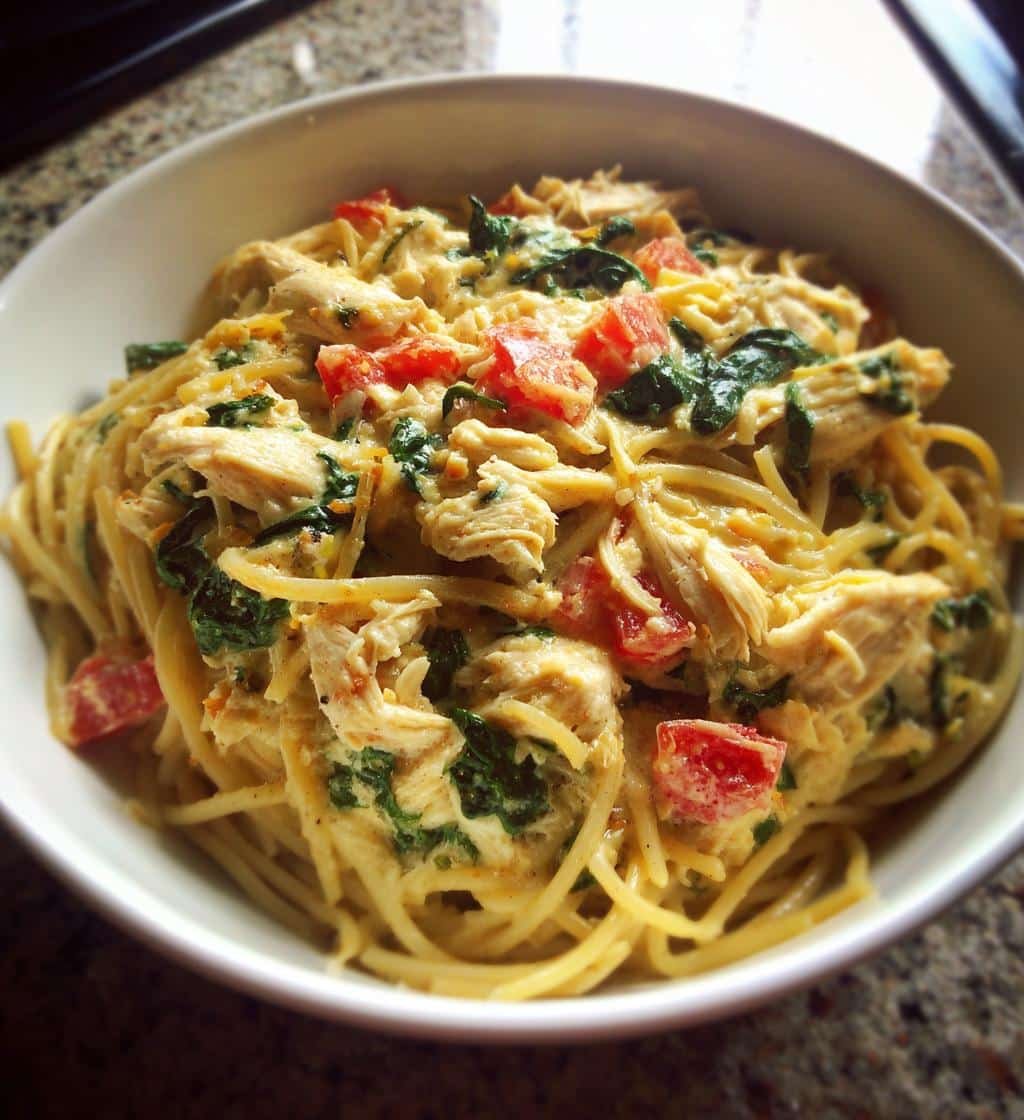 Healthy easy creamy crockpot chicken spaghetti