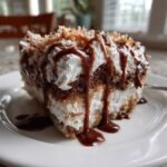 Mounds Poke Cake